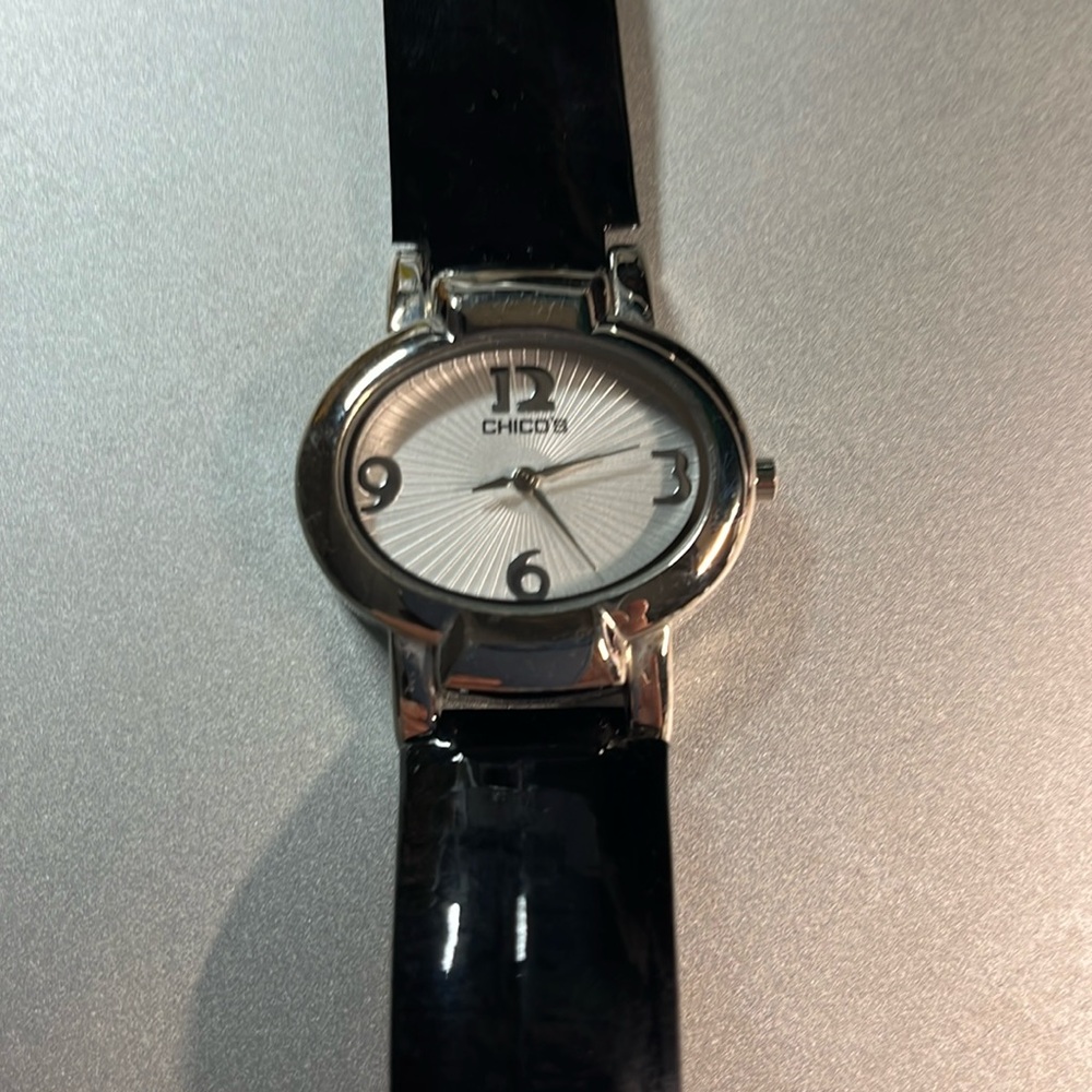 Chicos watch with white oval face & black leather band. Like new